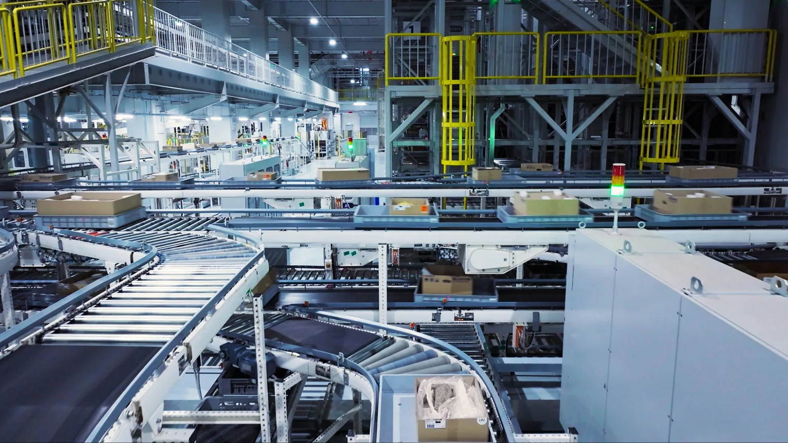 Parcels moving along a conveyor in a distribution hub powered by compressed air